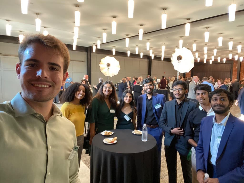 Stuti and fellow attendees at a professional networking event