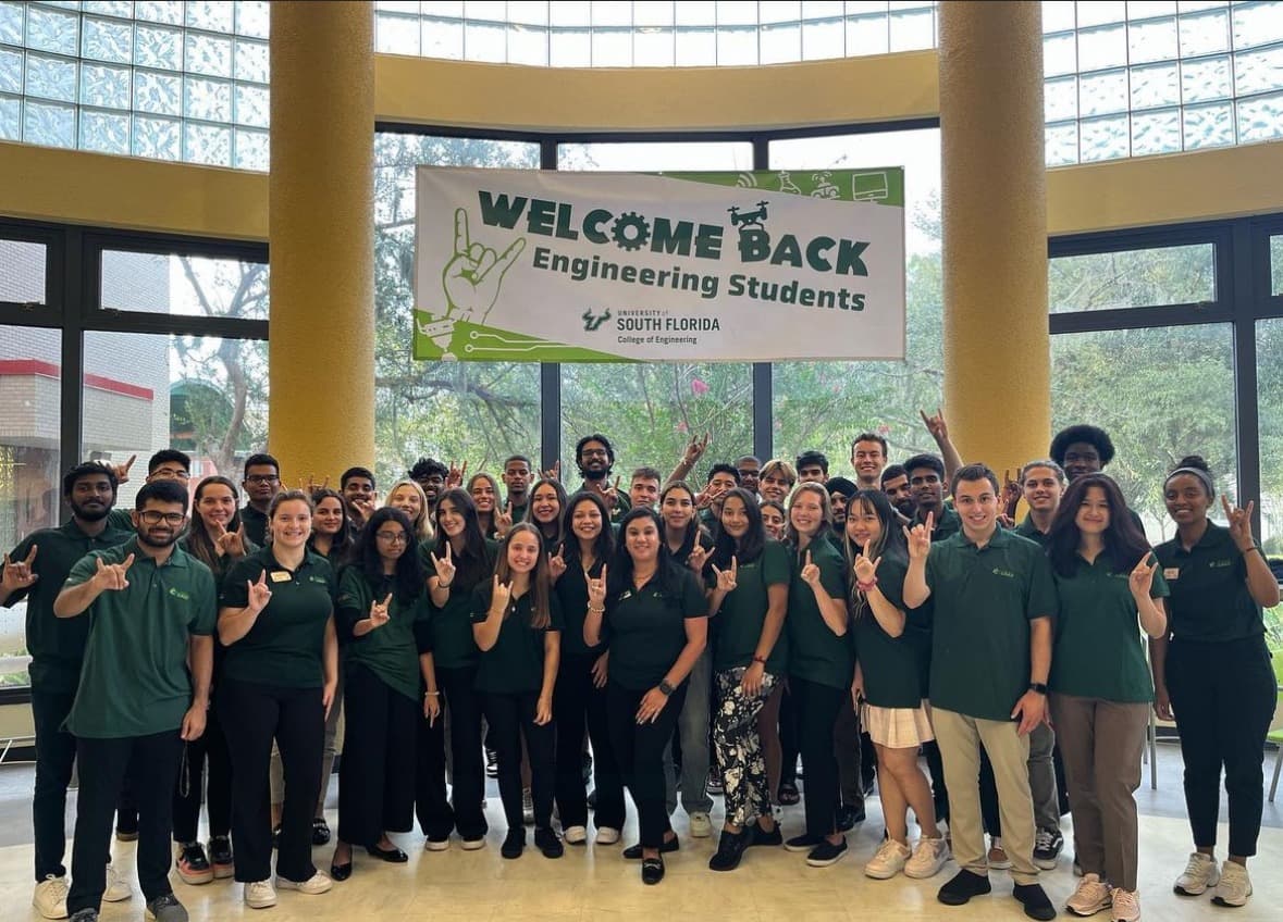 Engineering students gathered beneath a welcome-back banner at USF
