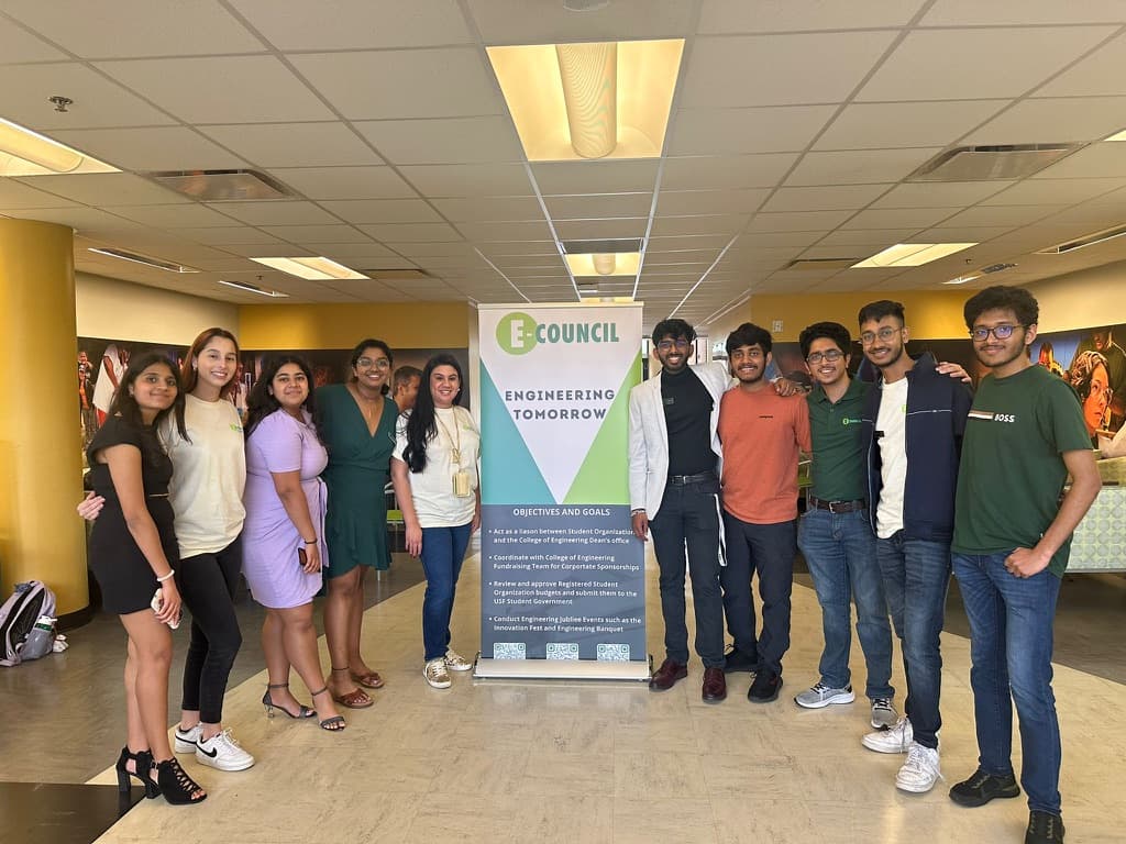 Stuti and fellow student leaders beside an Engineering Council banner